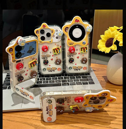 Cute 3D M&M’s Candy Phone Case with Star Camera Frame, Clear TPU Anti-Fall Cover with Foldable Stand & Mirror for iPhone